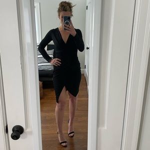 Black formal long sleeve dress. Never worn. V neck.